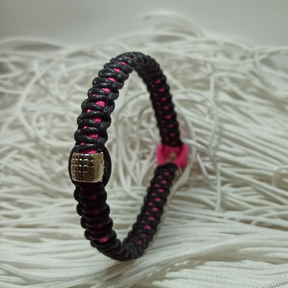 jewel paracord bracelet in waxed cotton and neon polyester cord with steel beadings