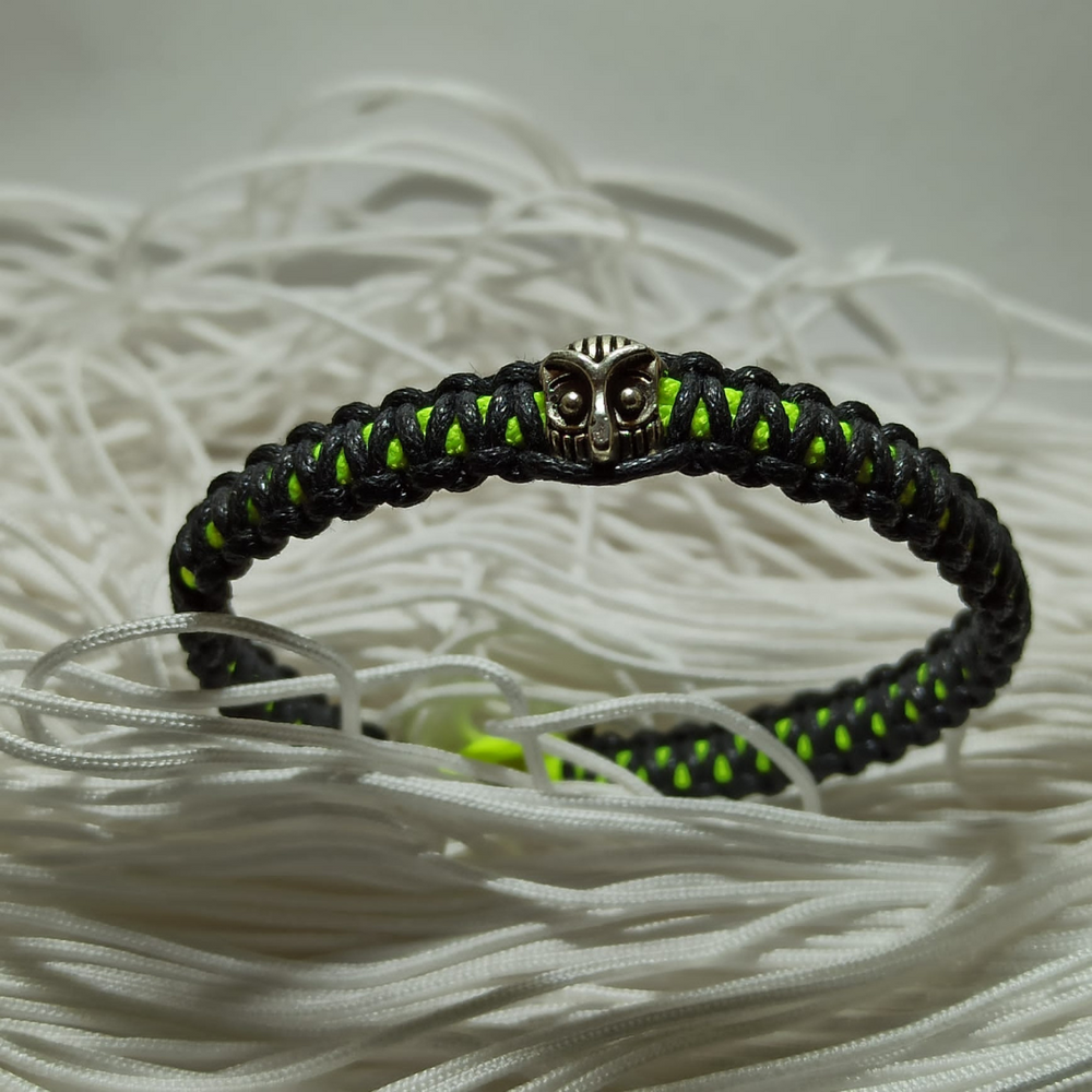 jewel paracord bracelet in waxed cotton and neon polyester cord with steel beadings