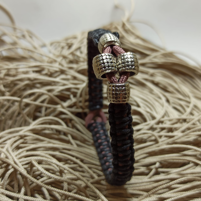 jewel paracord bracelet in waxed cotton and polyester cord with steel beadings