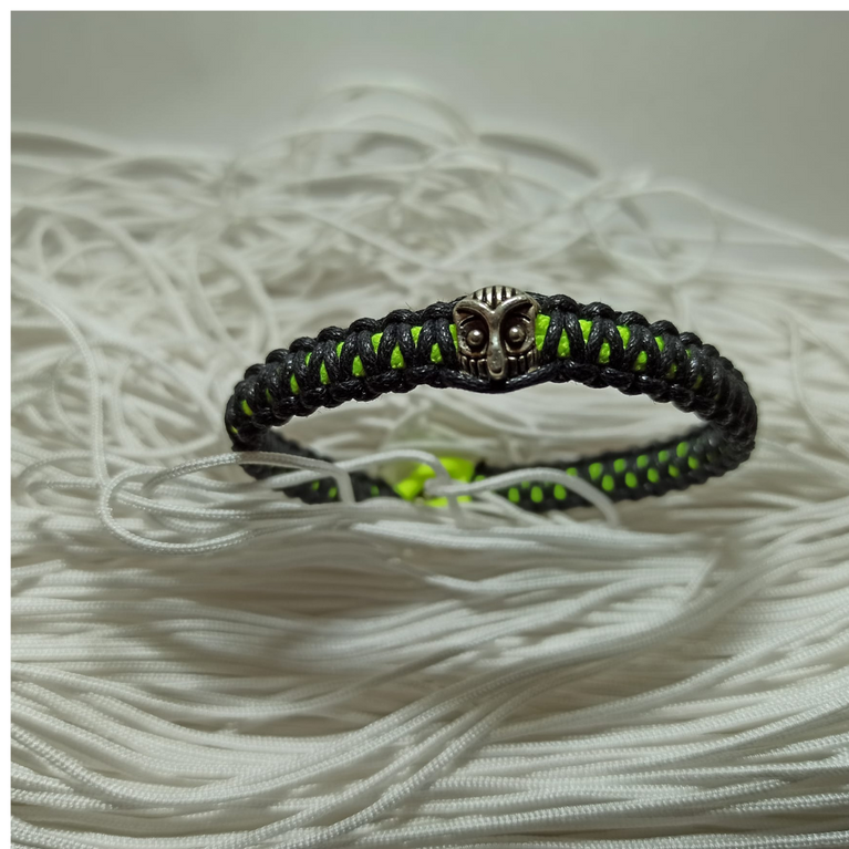 jewel paracord bracelet in waxed cotton and neon polyester cord with steel beadings