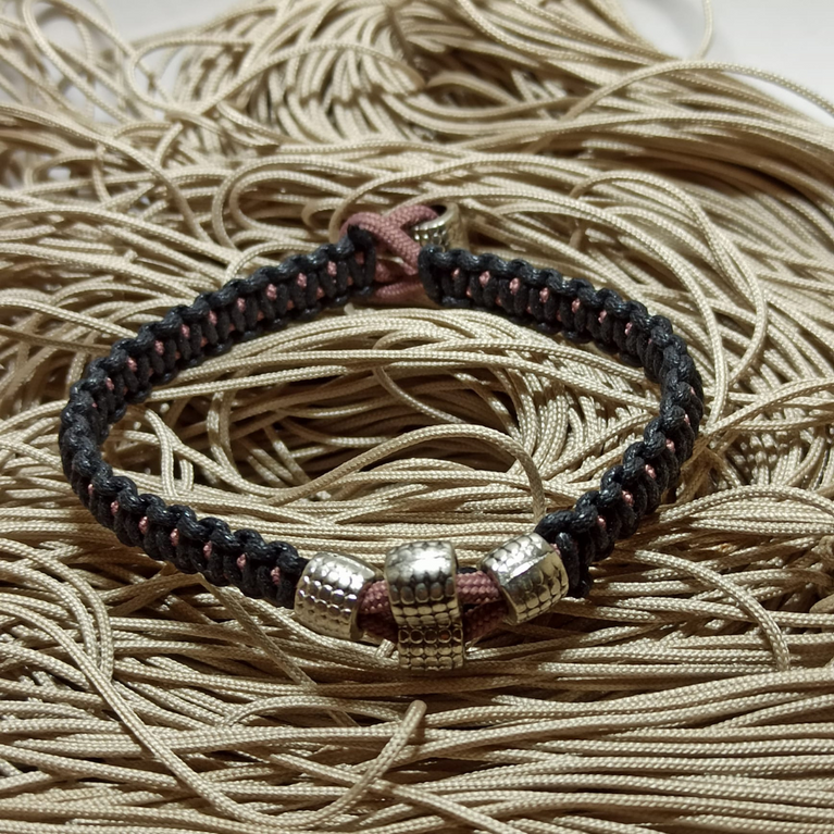 jewel paracord bracelet in waxed cotton and polyester cord with steel beadings